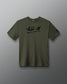An olive green short-sleeve t-shirt with 'ALL IN' printed in black script across the chest, displayed against a dark gray gradient background.
