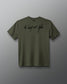 An olive green short-sleeve t-shirt with a black script graphic reading 'A Way of Life' across the chest, displayed against a neutral gray background.