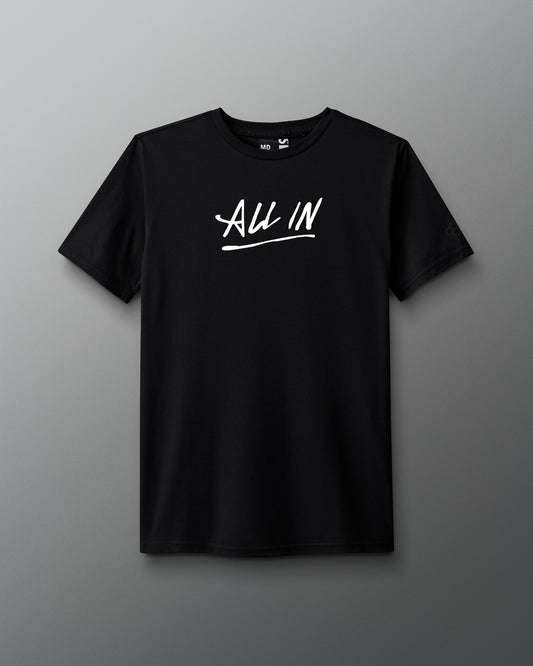 Front view of a black T-shirt with the phrase ‘ALL IN’ printed in bold white handwritten-style lettering across the chest, with an underline.