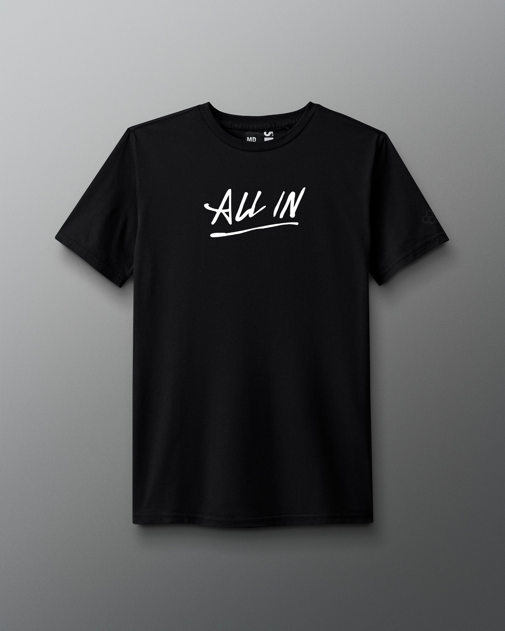 Front view of a black T-shirt with the phrase ‘ALL IN’ printed in bold white handwritten-style lettering across the chest, with an underline.