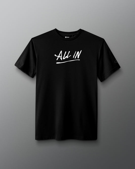Front view of a black T-shirt with the phrase ‘ALL IN’ printed in bold white handwritten-style lettering across the chest, with an underline.