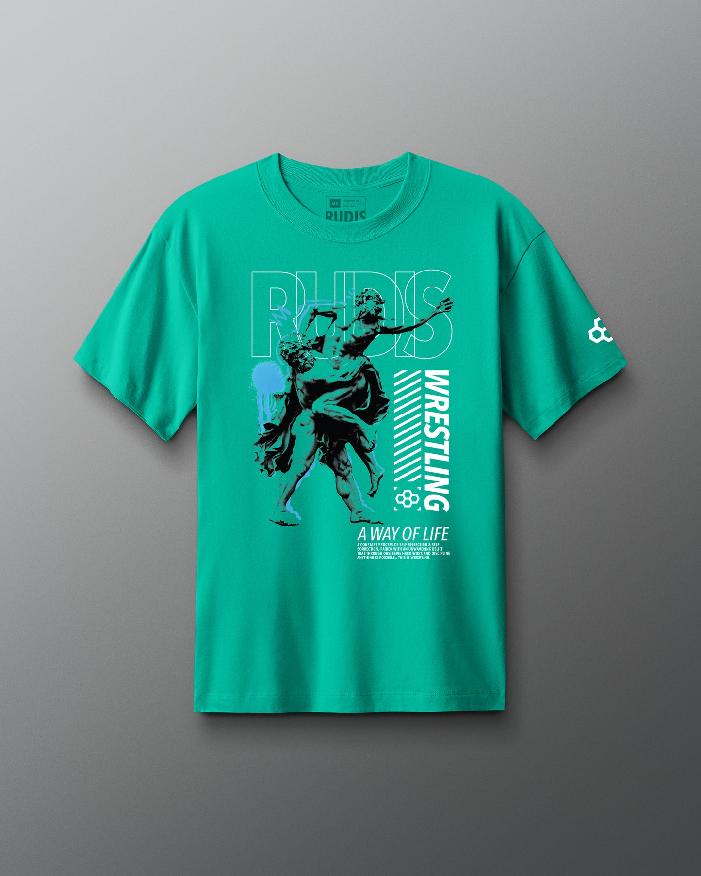 Green t-shirt with wrestling graphic and text on a gray background