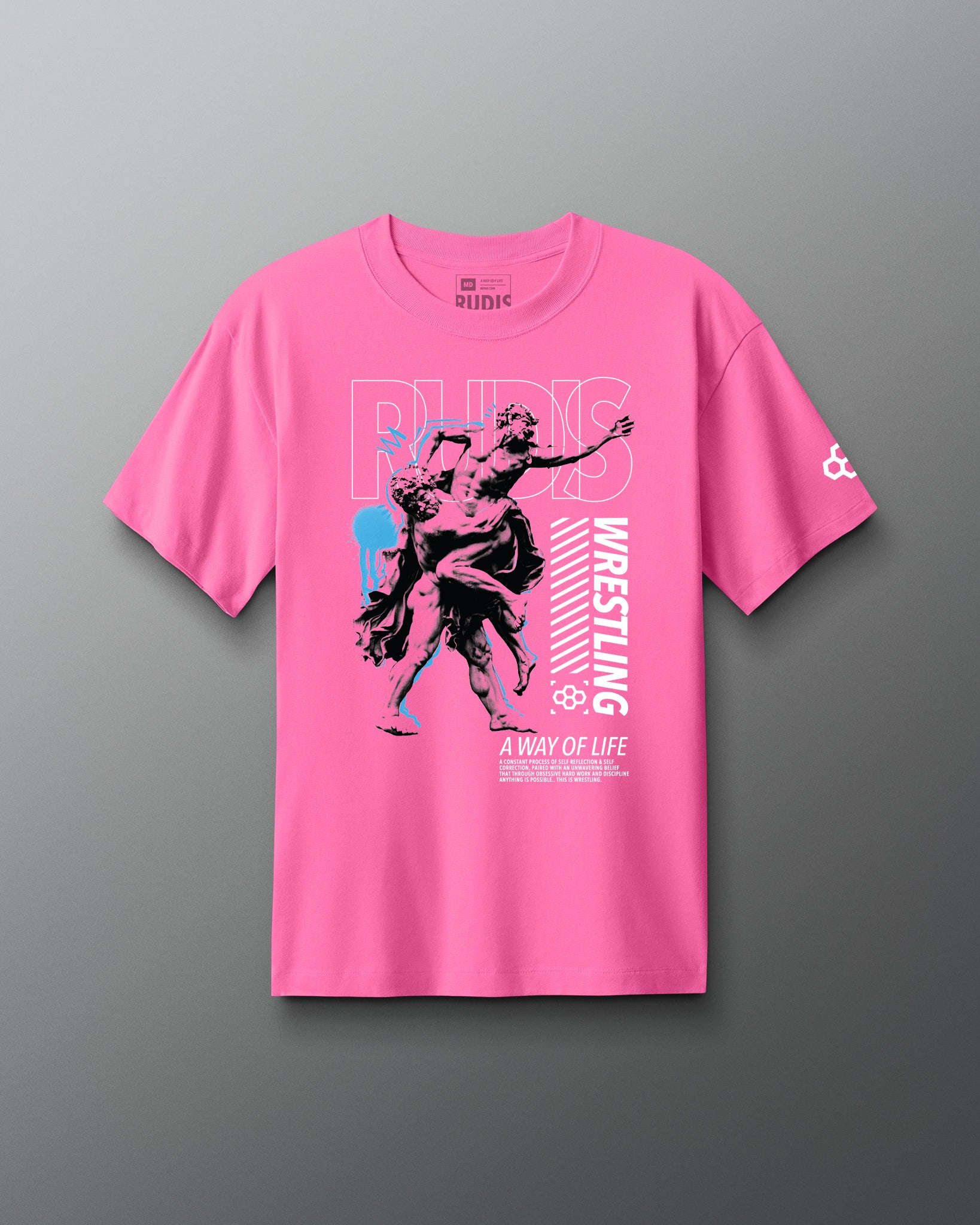 Pink t-shirt with wrestling graphic and text on a gray background