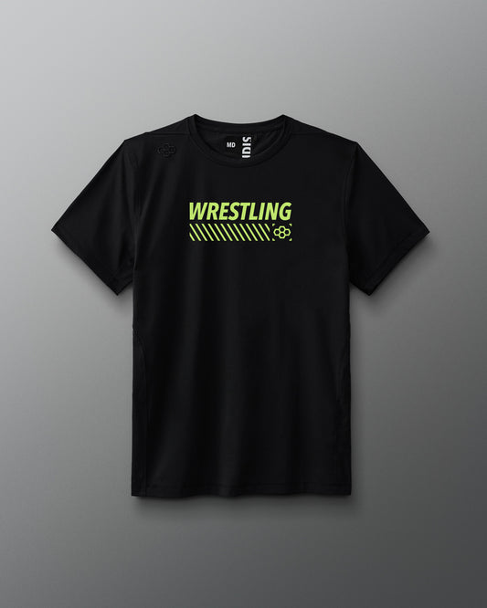 A black short-sleeve athletic T-shirt displayed against a gray background. Across the chest, bold neon yellow-green text reads “WRESTLING” above diagonal stripes and a small hexagonal RUDIS logo. The shirt has a modern athletic fit and minimal seams.