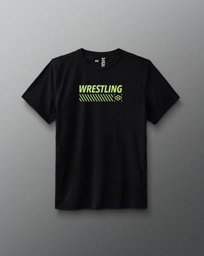 A black short-sleeve athletic T-shirt displayed against a gray background. Across the chest, bold neon yellow-green text reads “WRESTLING” above diagonal stripes and a small hexagonal RUDIS logo. The shirt has a modern athletic fit and minimal seams.