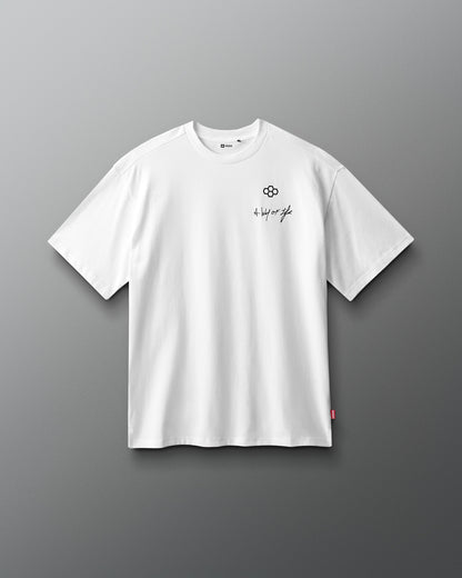 White t-shirt with a logo and text on a gray background