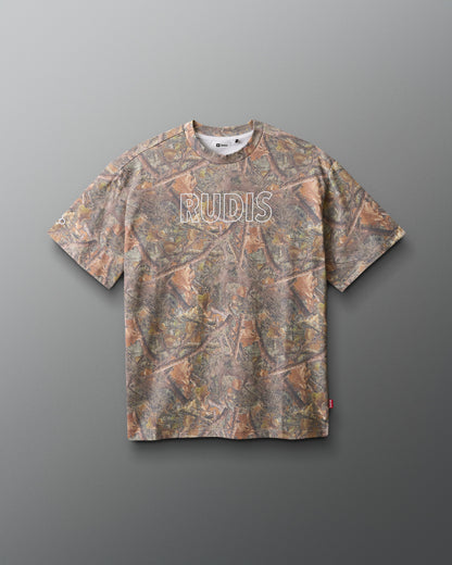 Camouflage-patterned t-shirt with 'RUDIS' branding on a gray background