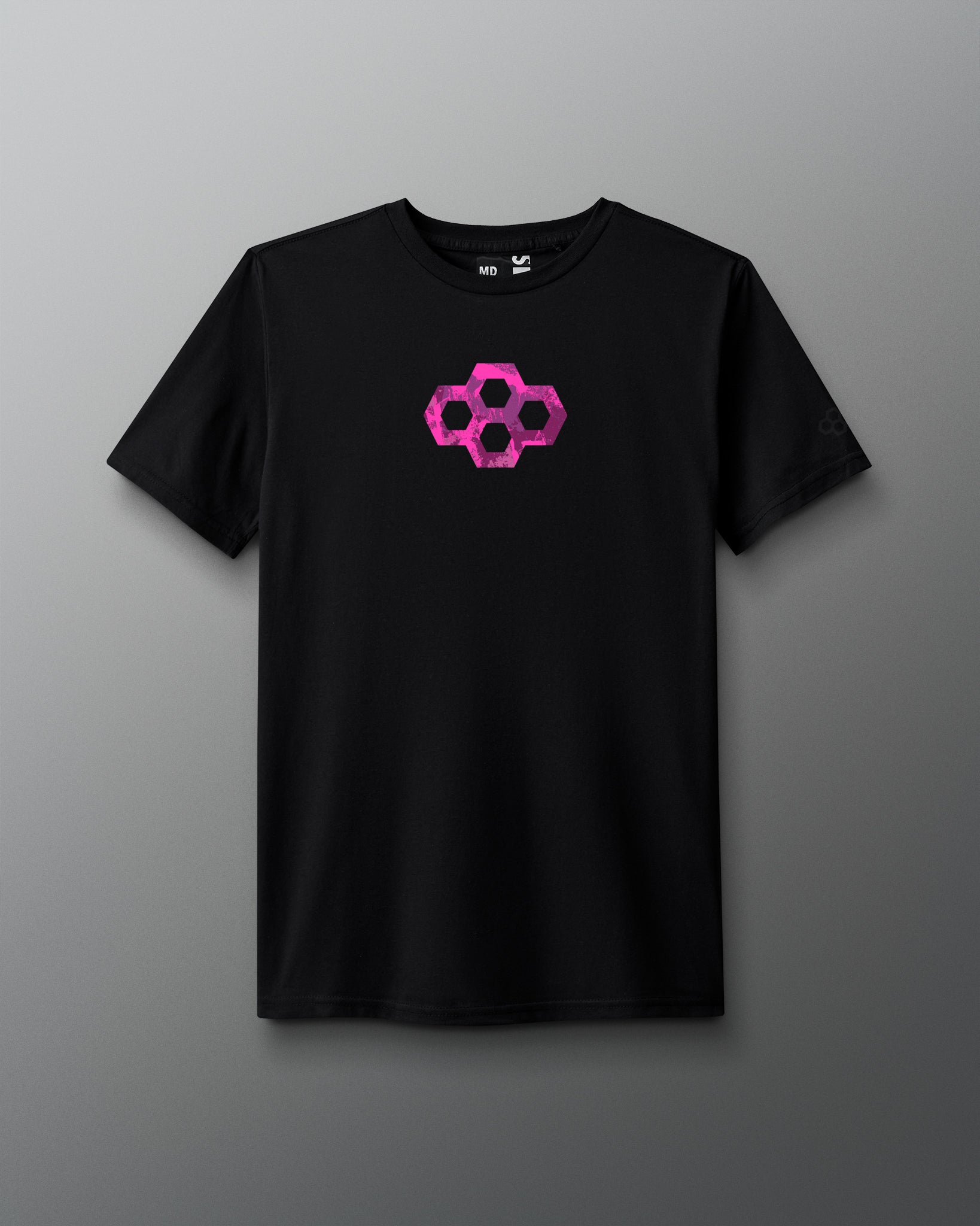 Black t-shirt with a pink geometric design on a gray background