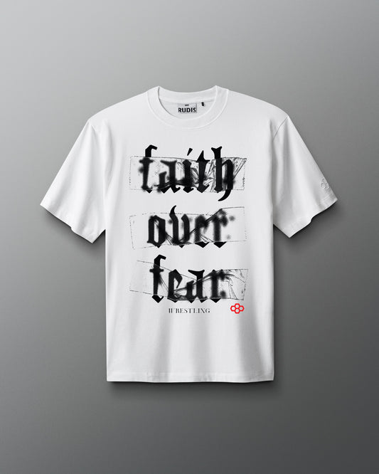 White t-shirt with 'faith over fear' text on a gray background