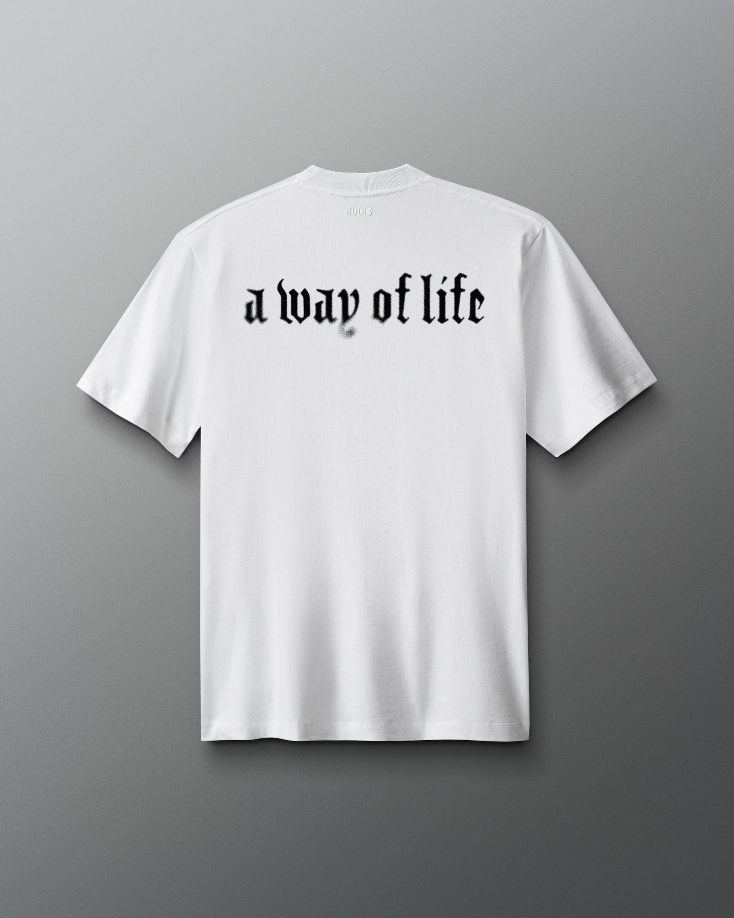 White t-shirt with 'a way of life' text on a gray background