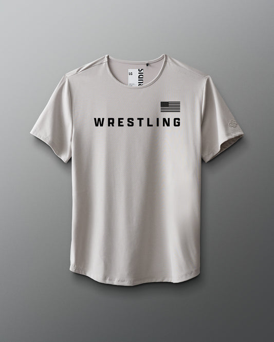 White t-shirt with 'Wrestling' text and American flag on a gray background