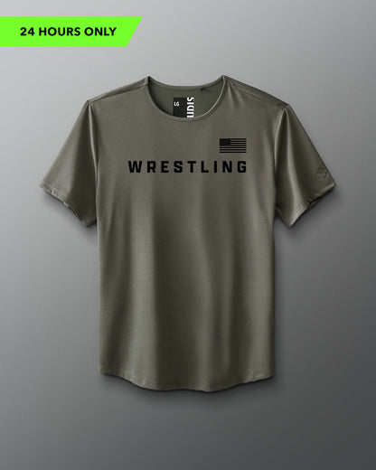 Green t-shirt with 'Wrestling' text and American flag on a gray background