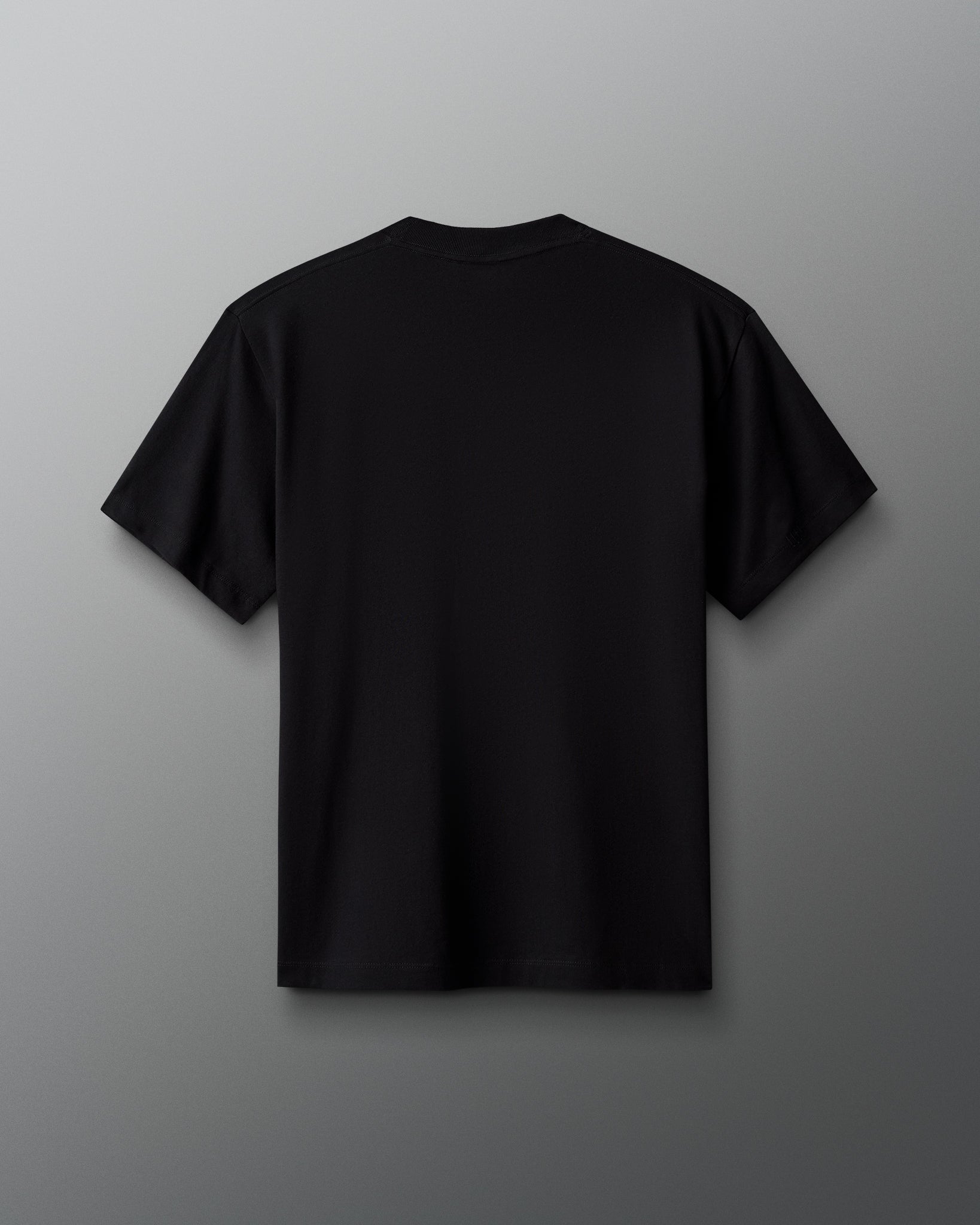 Black t-shirt on a gray background