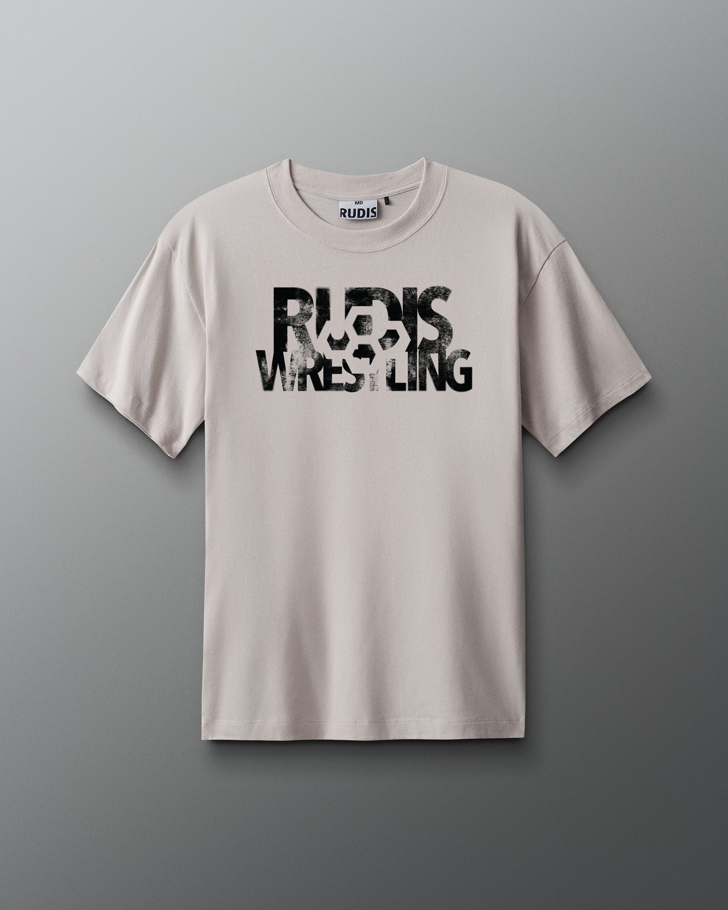 Beige t-shirt with 'RUDIS WRESTLING' text on a gray background