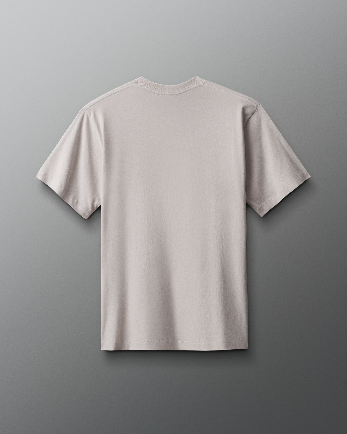 Beige t-shirt on a gray background