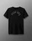 Black t-shirt with 'FEAR NOT' text on a gray background
