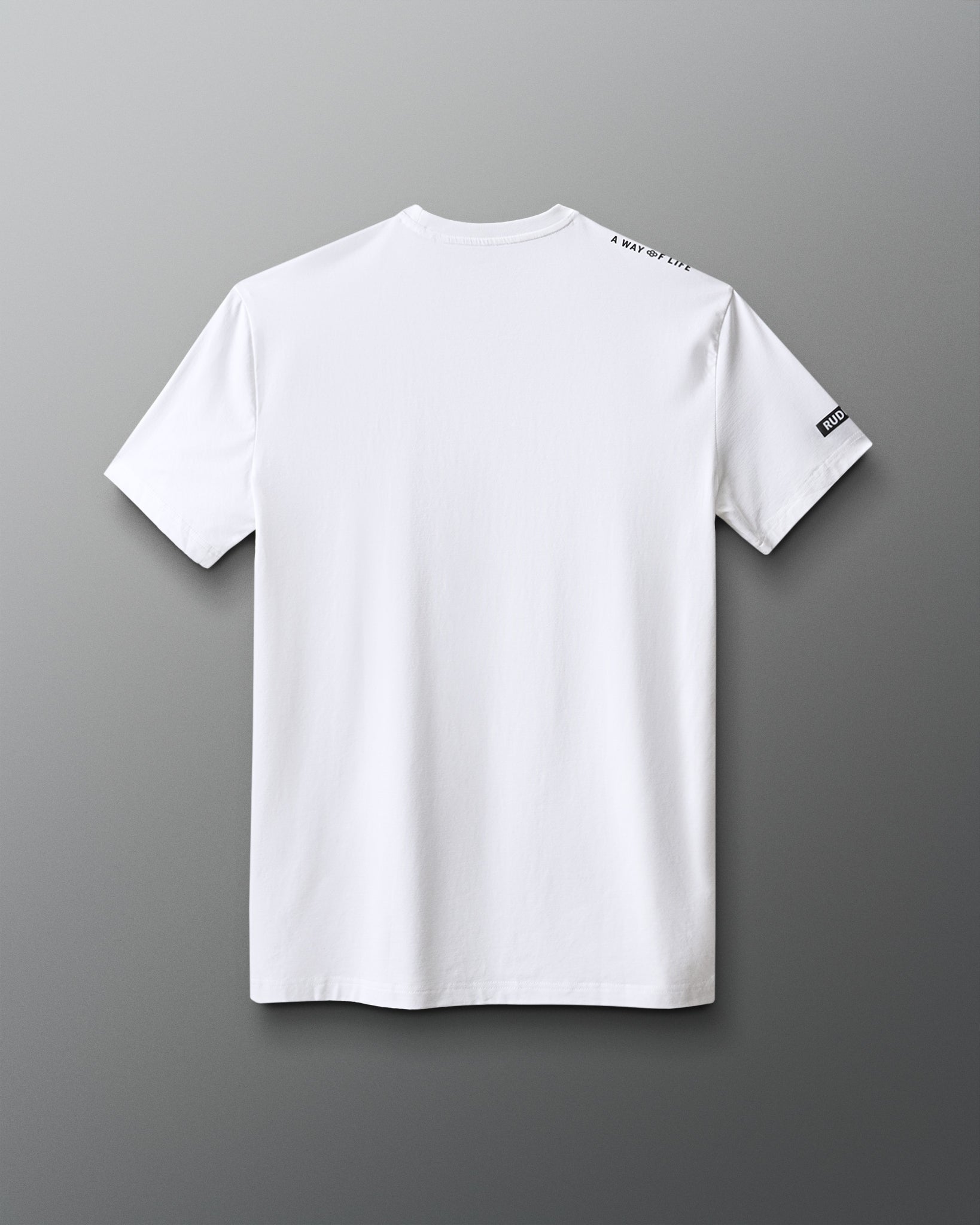 White t-shirt with a brand logo on the sleeve against a gray background