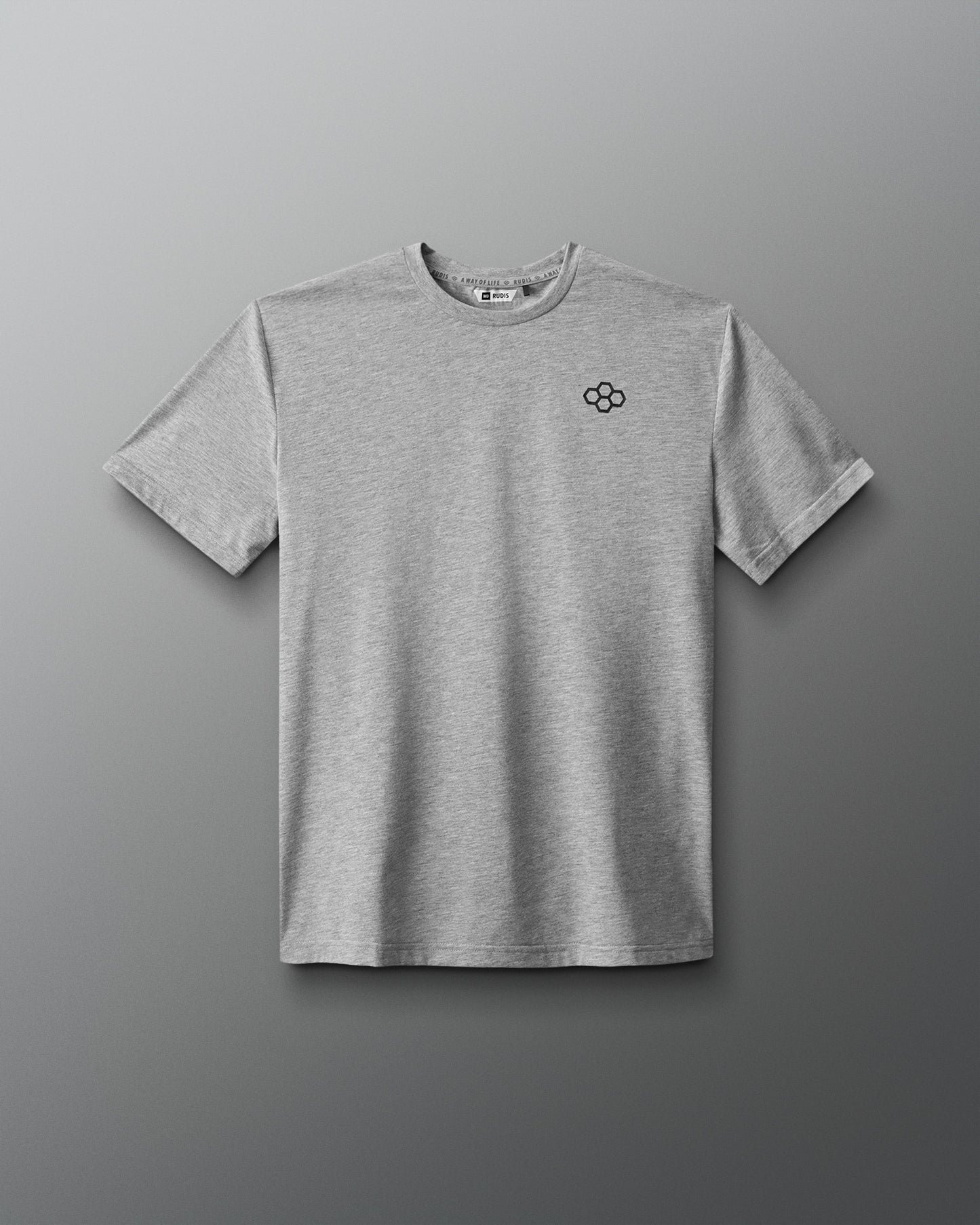 Gray t-shirt with a small logo on a gray background