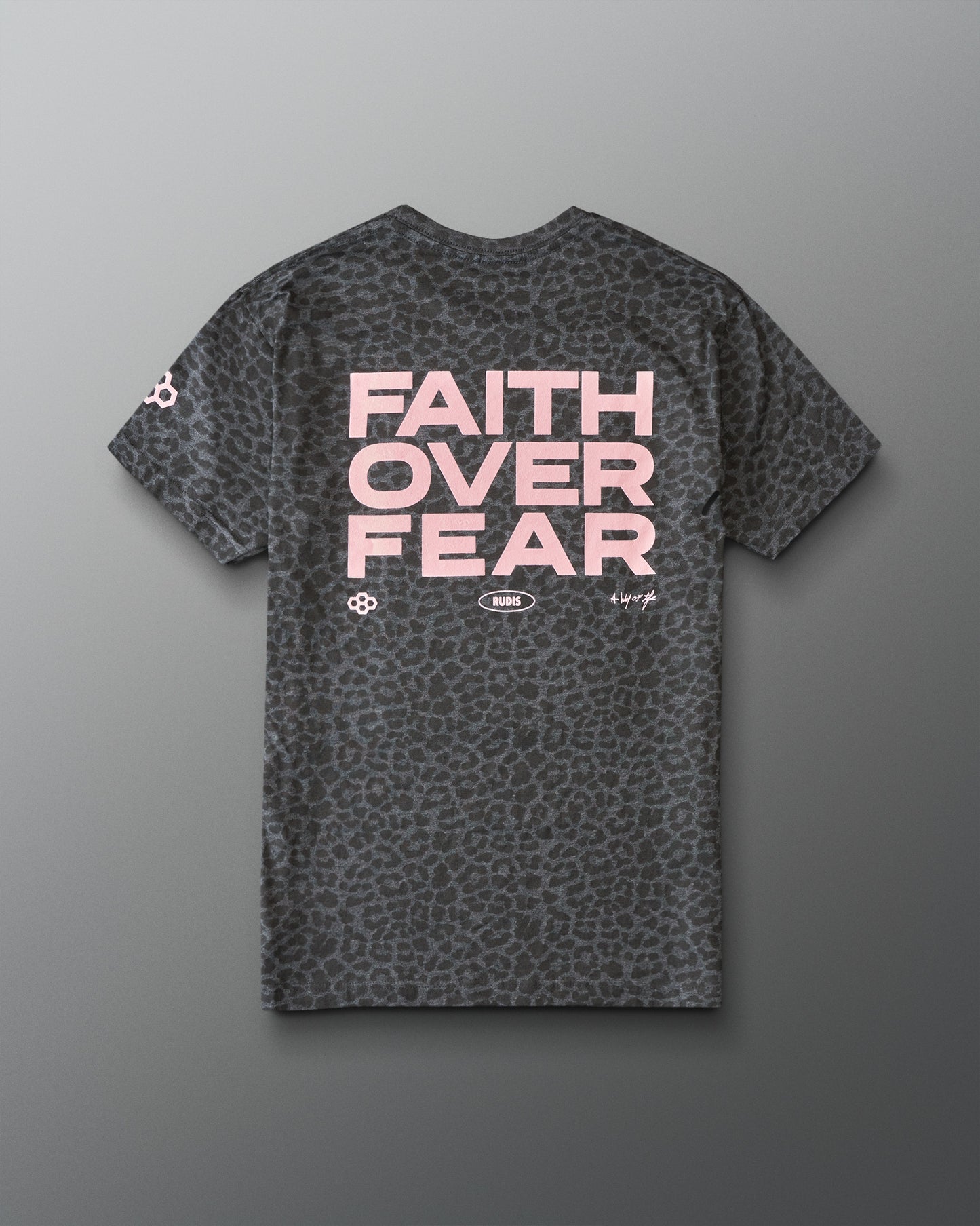 Gray animal printed t-shirt with leopard print pattern and 'Faith Over Fear' text on a gray background