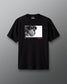 Black t-shirt with a graphic design on a gray background