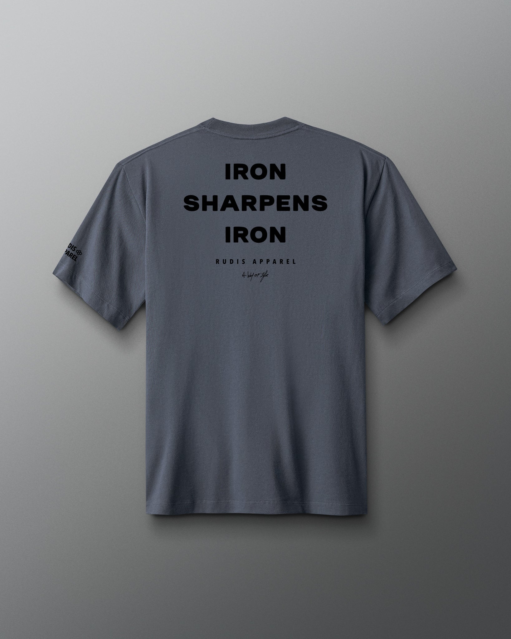 Gray t-shirt with 'Iron Sharpens Iron' text on the back against a gray background