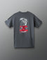 Gray t-shirt with a graphic design and 'Be strong and courageous' text on the back against a gray background