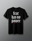 Black t-shirt with 'fear has no power' text on a gray background