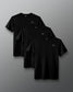 Three black short-sleeve crewneck t-shirts with a small white geometric logo on the left chest, arranged in a staggered overlapping layout on a dark gray gradient background.