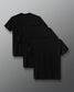 Three black short-sleeve crewneck t-shirts arranged in a cascading stack on a dark gray gradient background.