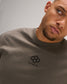 Detailed close-up of the RUDIS Hex Classic Cotton T-Shirt in Army, showcasing the black embroidered Hex logo, cotton fabric and ribbed crew neckline.