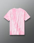 Back view of RUDIS Script Wrestling Classic Cotton T-Shirt in pink and white tie-dye with subtle RUDIS branding below the collar.