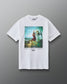 Front view of the RUDIS Divine Struggle Relaxed Cotton T-Shirt in White featuring colorful vintage-inspired wrestling artwork, The Oldest Sport graphic, and RUDIS branding.