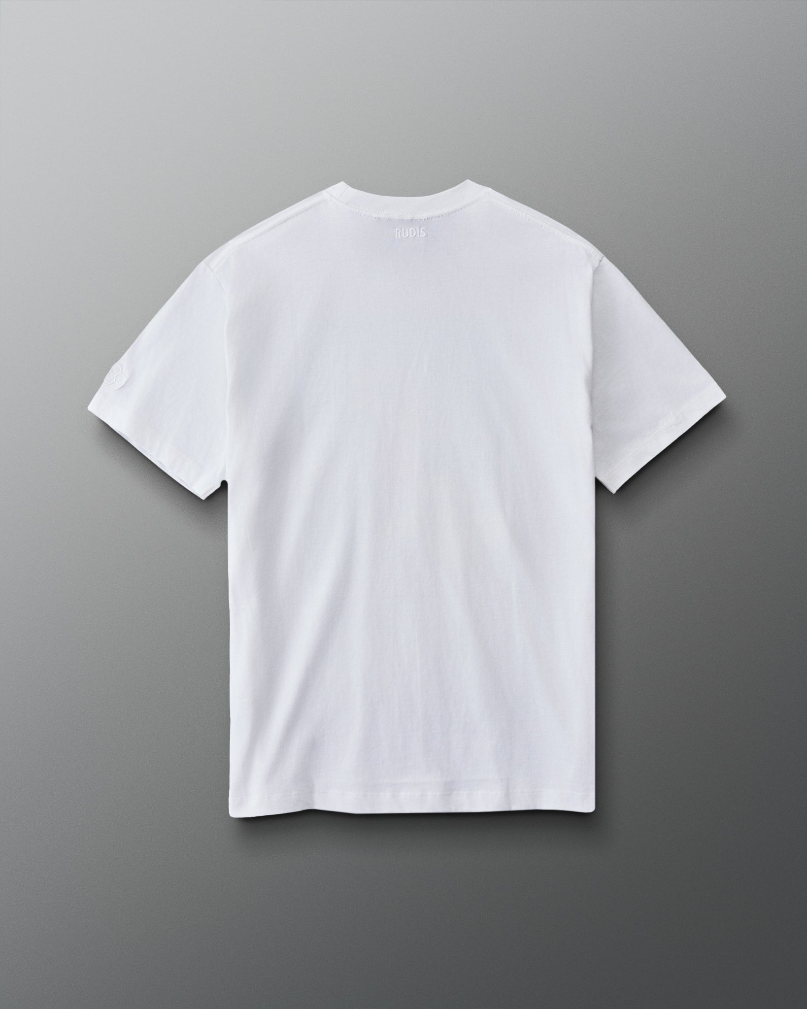Back view of the RUDIS Divine Struggle Relaxed Cotton T-Shirt in White with a clean, minimal design and subtle RUDIS branding below the collar.
