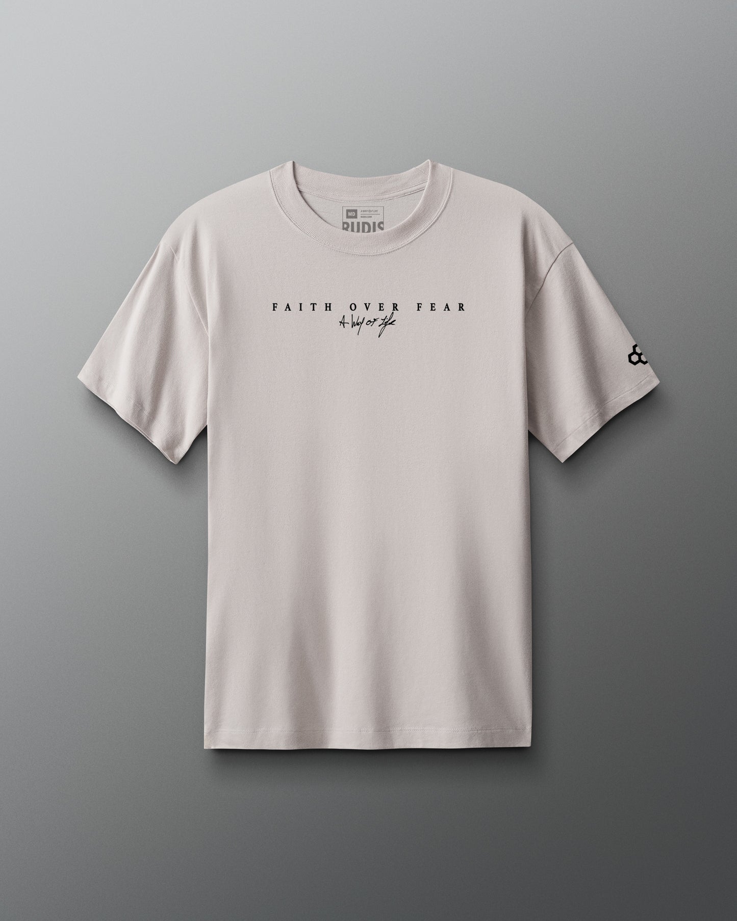 Beige t-shirt with 'Faith Over Fear' text on a gray background