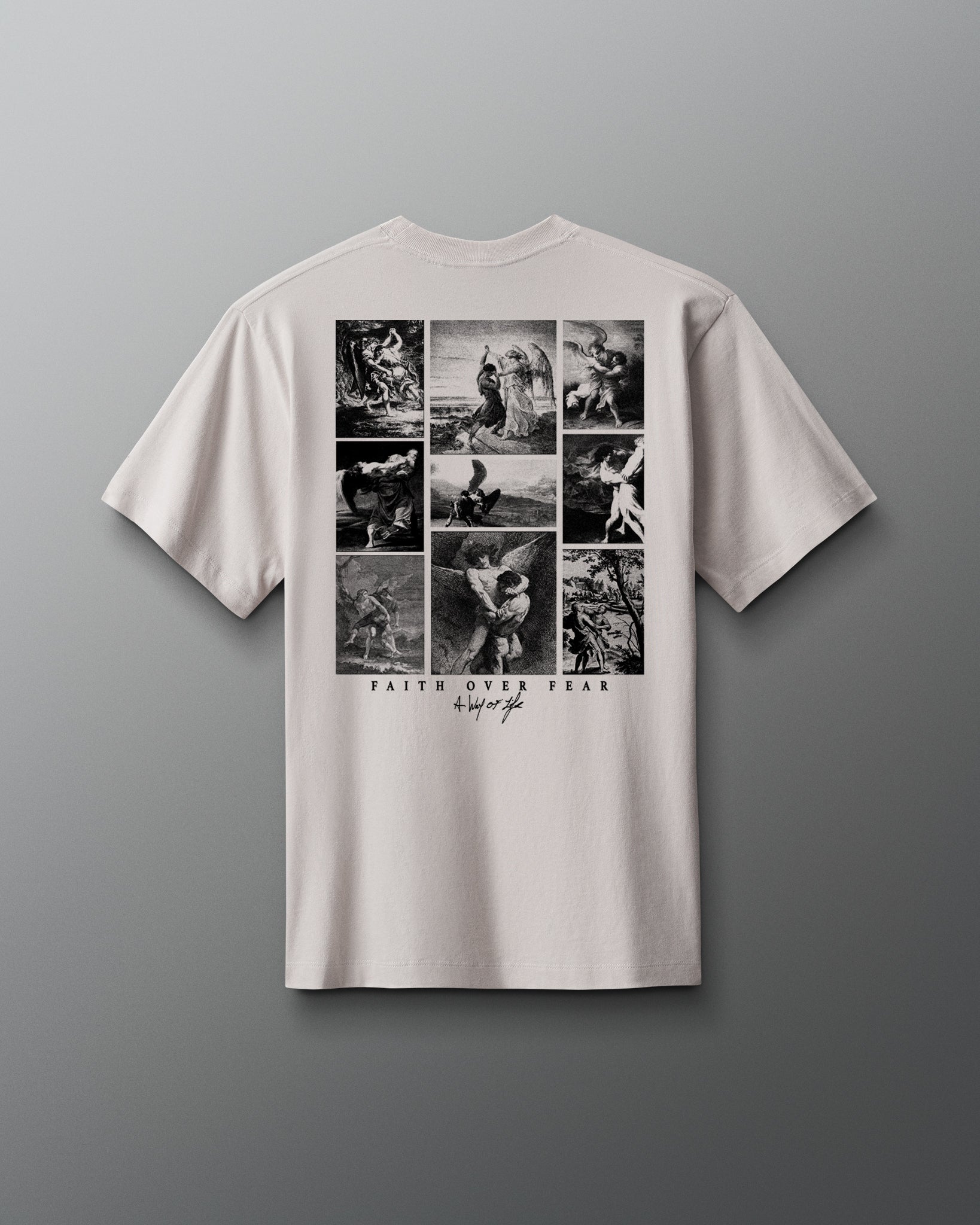 White t-shirt with black graphic design on a gray background