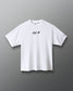 A white short-sleeve crewneck t-shirt with the words 'ALL IN' printed in black script across the chest, displayed against a dark gray gradient background.