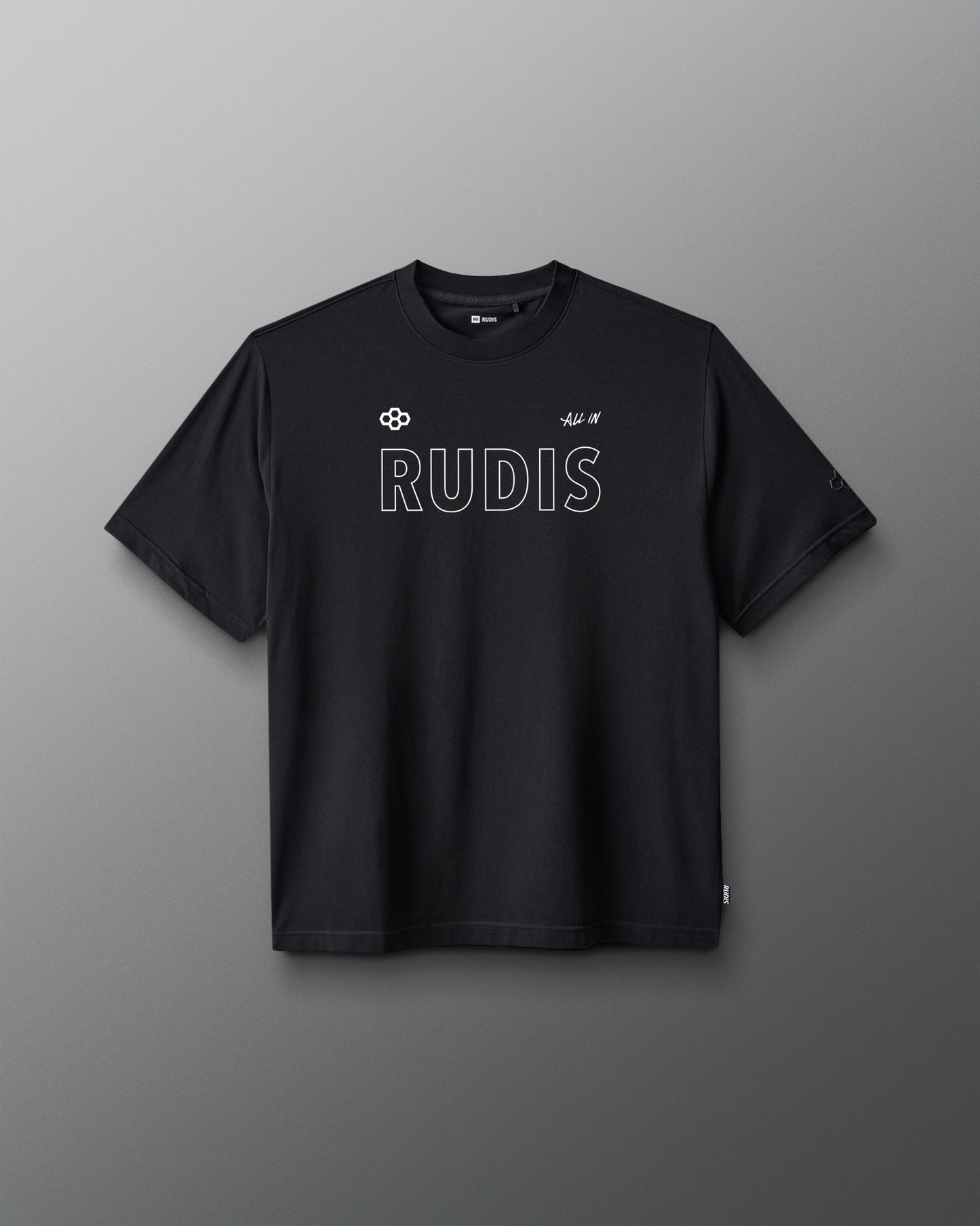 A black short-sleeve crewneck t-shirt with 'RUDIS' printed in white outline text across the chest, displayed against a dark gray gradient background.