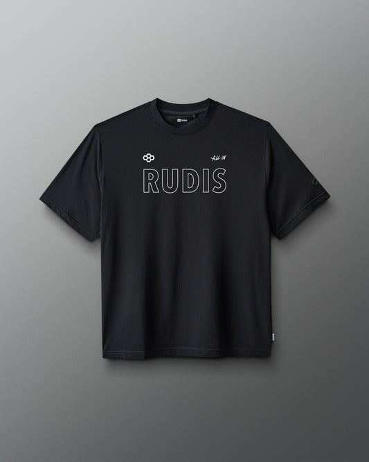 A black short-sleeve crewneck t-shirt with 'RUDIS' printed in white outline text across the chest, displayed against a dark gray gradient background.