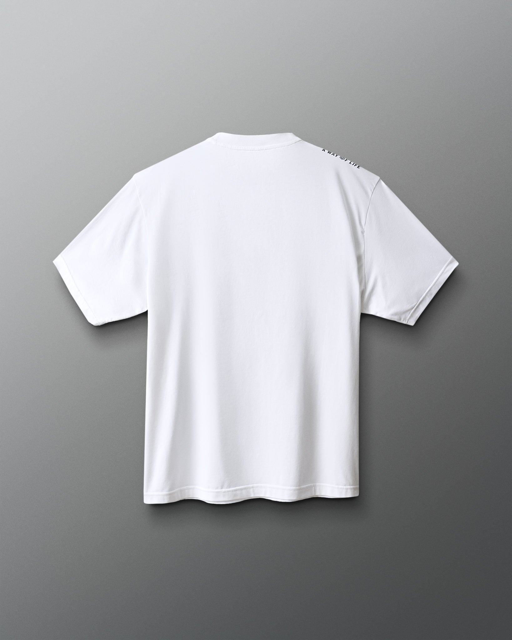 White t-shirt on a gray background