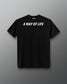 Back view of the black RUDIS Core Flag Elite Super Soft T-Shirt featuring bold white “A WAY OF LIFE” lettering across the upper back with RUDIS branding at the neckline.