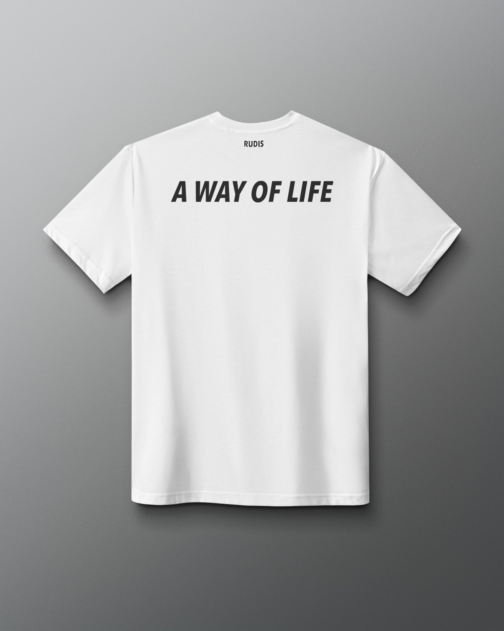 Back view of the white RUDIS Core Flag Elite Super Soft T-Shirt featuring bold black “A WAY OF LIFE” lettering across the upper back with RUDIS branding at the neckline.