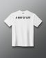 Back view of the white RUDIS Core Flag Elite Super Soft T-Shirt featuring bold black “A WAY OF LIFE” lettering across the upper back with RUDIS branding at the neckline.