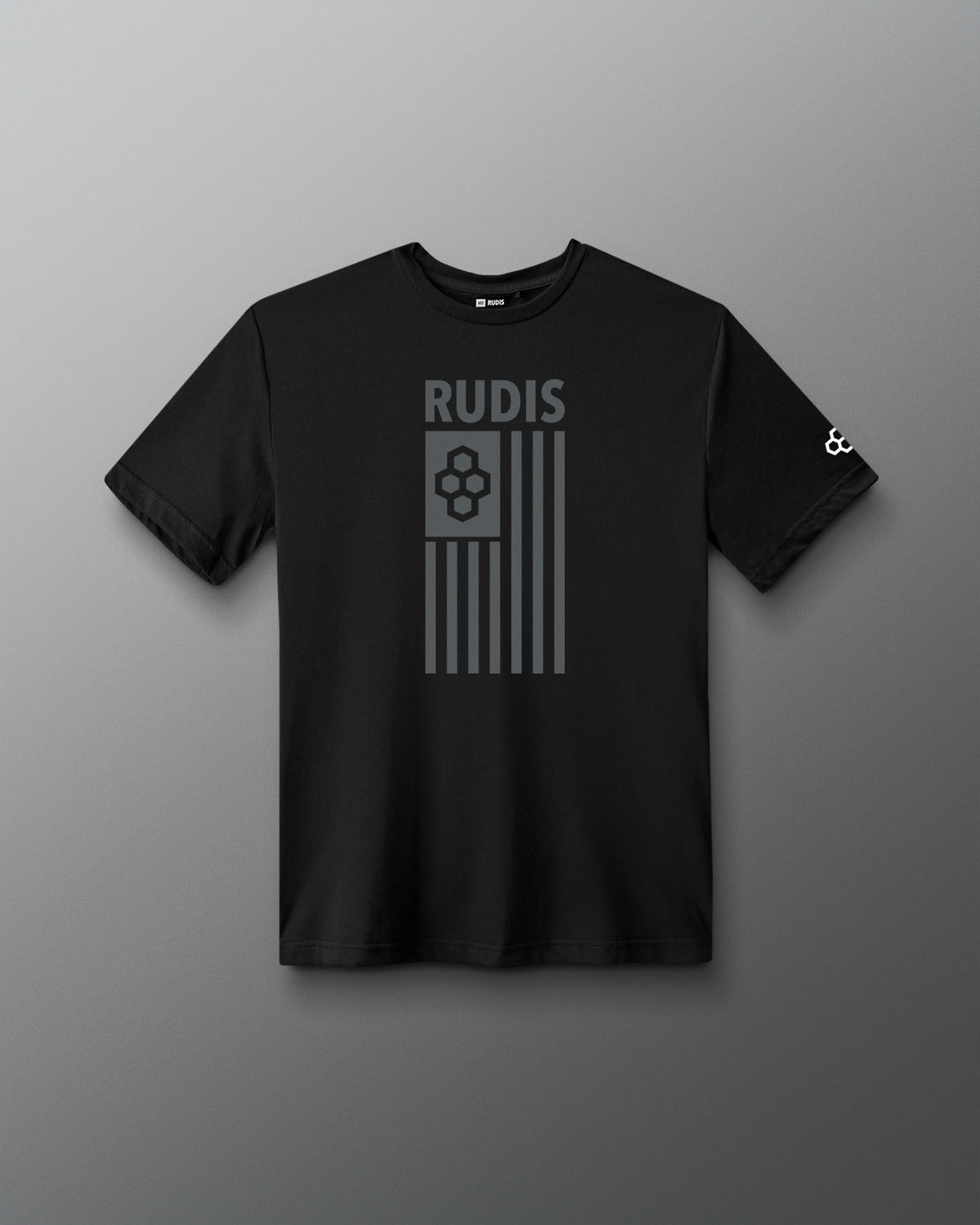 A black short-sleeve crewneck t-shirt with a gray graphic on the front featuring the word 'RUDIS' above a stylized flag design, displayed against a dark gray gradient background.