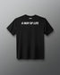 A black short-sleeve t-shirt with 'A WAY OF LIFE' printed in white across the chest and a small 'RUOIS' brand logo above it, displayed against a dark gray gradient background.