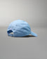 Light blue baseball cap on a gray background