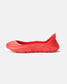 A vibrant red slip-on shoe featuring a sleek fluid design and a textured sole ideal for casual wear and comfort