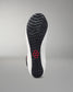 Sole of a wrestling shoe with a brand logo on a gray background