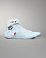 Light blue wrestling shoe with black logo on a gray background