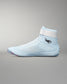 Light blue wrestling shoe with white accents on a gray background