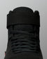 Close-up of the RUDIS Samurai Speed Wabi-Sabi wrestling shoe, highlighting black laces, textured mesh tongue, and wide ankle support strap.
